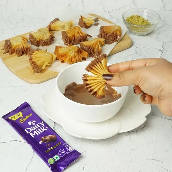 Dairy Milk Coated Baklava Fan Sweet-Dip the fans tips into the melted chocolate