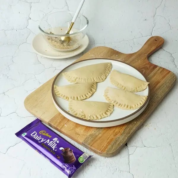 Dairy Milk Coconut Karanji-Keep all the karanji on a plate