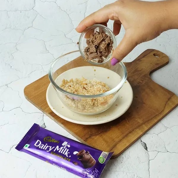 Dairy Milk Coconut Karanji-Add chopped Dairy Milk chocolate with coconut mixer