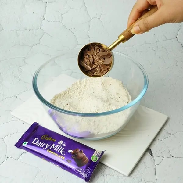 Dairy Milk Covered Cinnamon Loukoumades-Add chopped Dairy Milk next