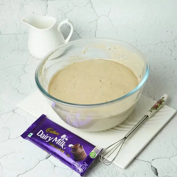 Dairy Milk Covered Cinnamon Loukoumades-Cover the bowl with a damp tea towel