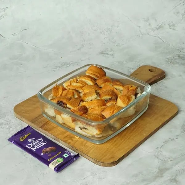 Dairy Milk Covered Croissant Pudding - Place all croissant pieces in a baking tray