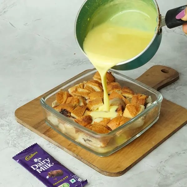 Dairy Milk Covered Croissant Pudding - Pour this custard mixer