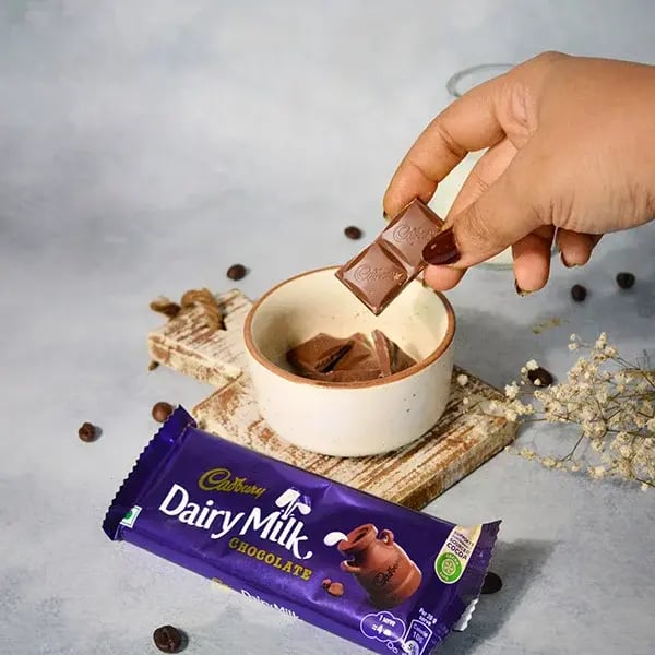 Dairy Milk Dalgona Iced Chocolate Coffee - Break the Dairy Milk chocolate