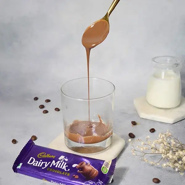 Dairy Milk Dalgona Iced Chocolate Coffee - Pour the melted chocolate