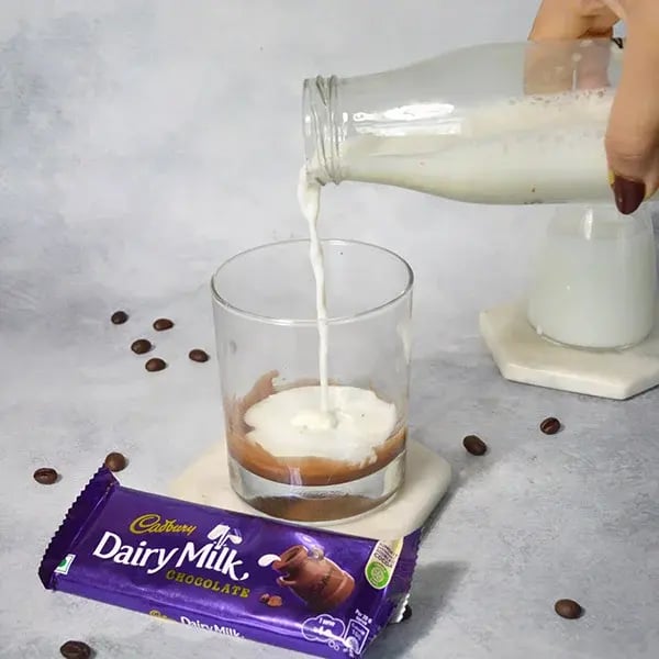 Dairy Milk Dalgona Iced Chocolate Coffee - Pour cold milk
