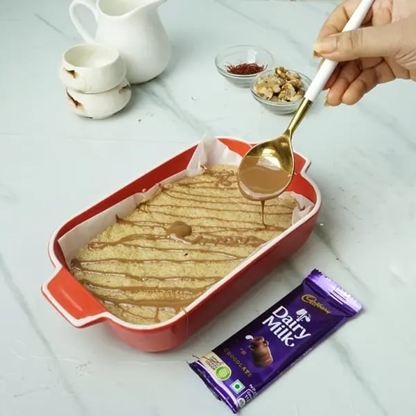 Dairy Milk Drizzle Walnut Kesar Barfi - Once melted drizzle the melted chocolates