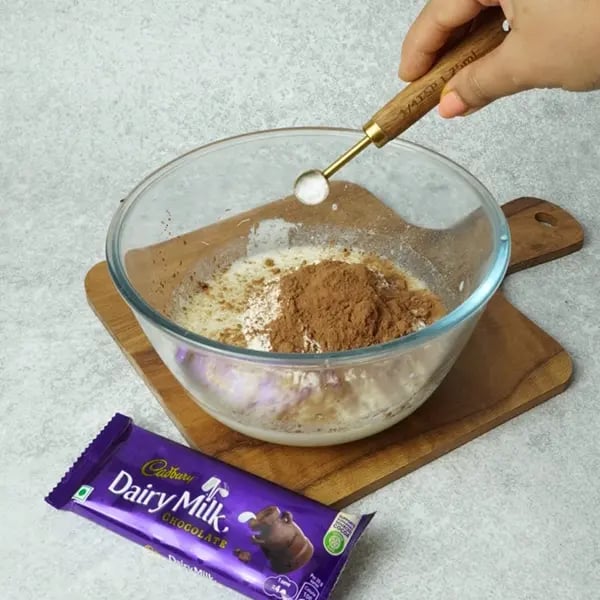 Dairy Milk Eggless Cake with Cocoa-Add baking soda