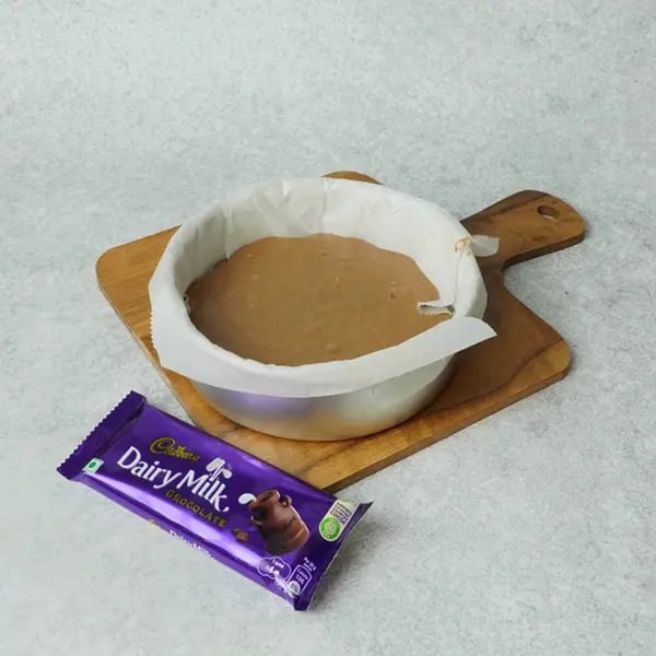 Dairy Milk Eggless Cake with Cocoa-Pour the batter