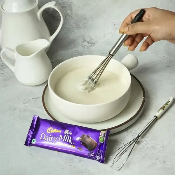 Dairy Milk Glazed Sel Roti- Whisk well till the sugar dissolves