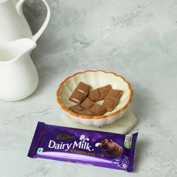 Dairy Milk Glazed Sel Roti- Take Cadbury Dairymilk chocolate