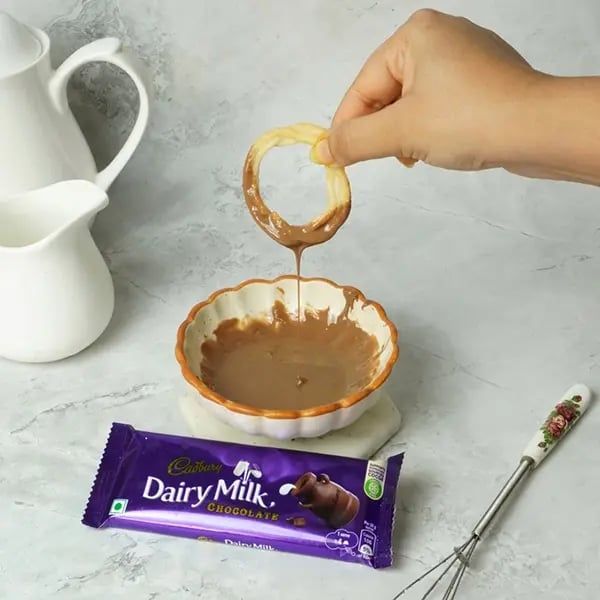 Dairy Milk Glazed Sel Roti- Microwave and melt the chocolate