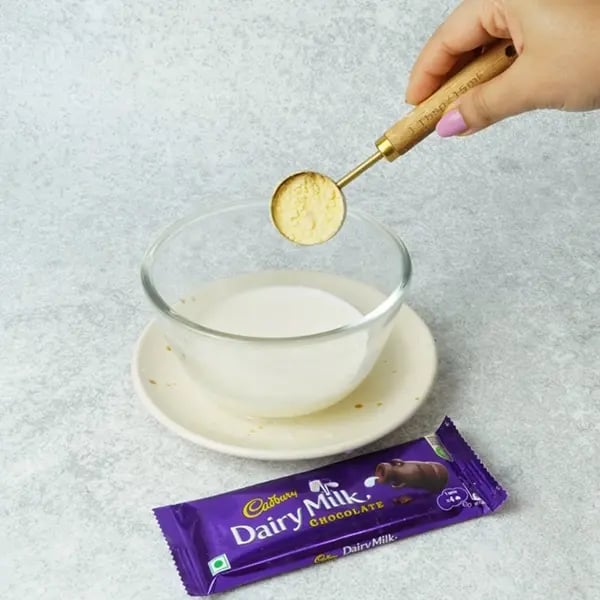 Dairy Milk Gulab Jamun Custard-In a small bowl