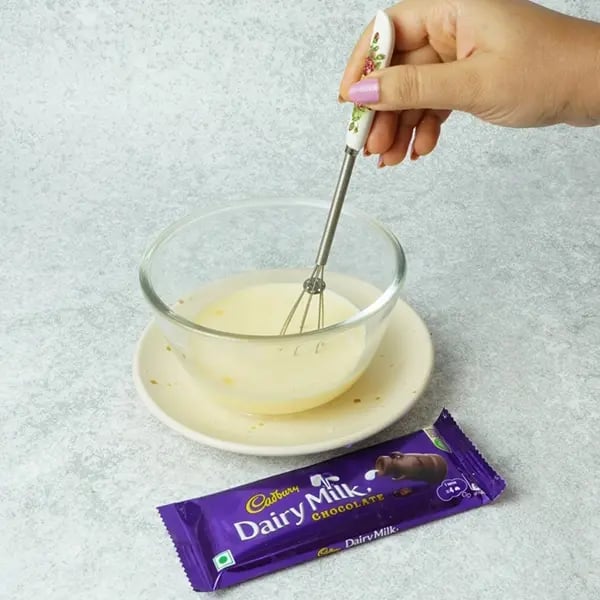 Dairy Milk Gulab Jamun Custard-Mix thoroughly until the custard powder