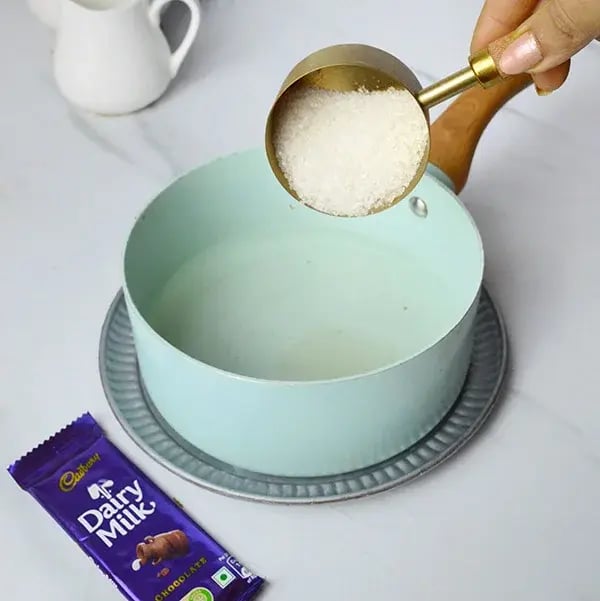 Dairy Milk Hazelnut Suji Halwa - Boil 2 cups of water