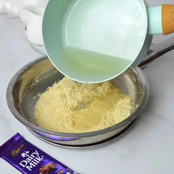 Dairy Milk Hazelnut Suji Halwa - Keep stirring