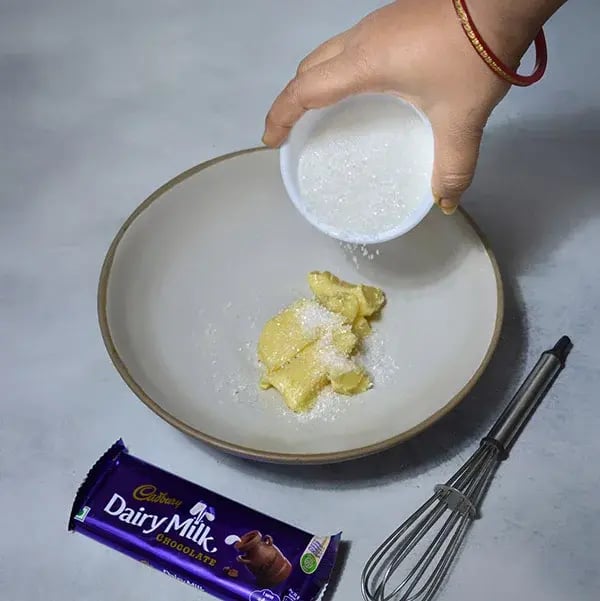 Dairy Milk Hot Chocolate Cupcakes - Add the butter