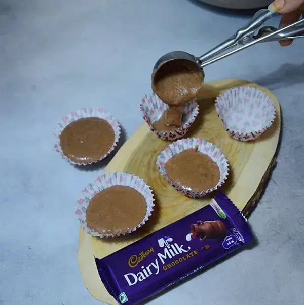 Dairy Milk Hot Chocolate Cupcakes - Pour the batter
