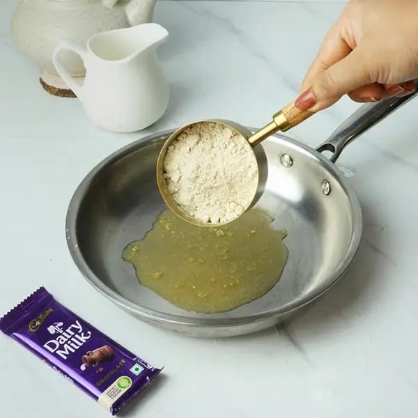 Dairy Milk Layered Pistachio Raisin Mysore Pak-Take a heavy bottom pan