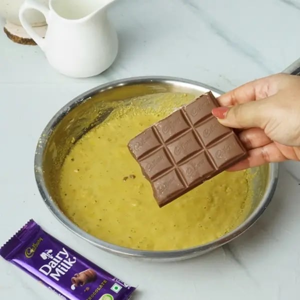 Dairy Milk Layered Pistachio Raisin Mysore Pak-Now add Cadbury Dairymilk chocolate