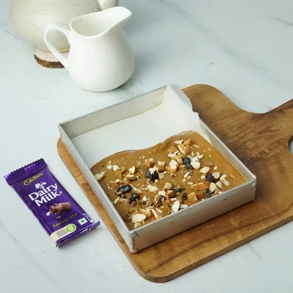 Dairy Milk Layered Pistachio Raisin Mysore Pak-Add chopped pistachio and raisin