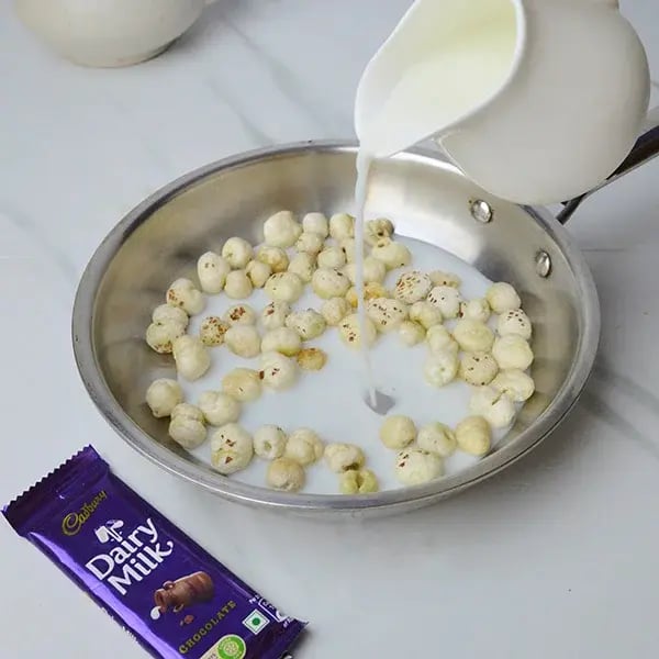 Dairy Milk Makhana Kheer - Add milk to the makhana