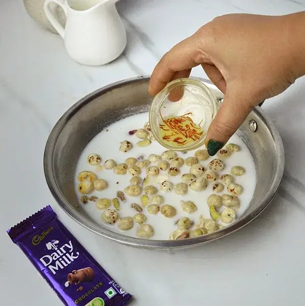 Dairy Milk Makhana Kheer - Add saffron milk