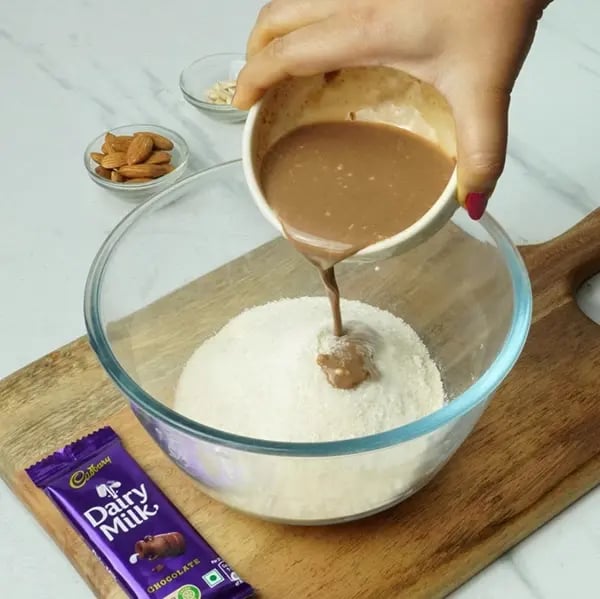 Dairy Milk Malpua with Cashew and Almonds - Chocolate milk with the dry ingredients