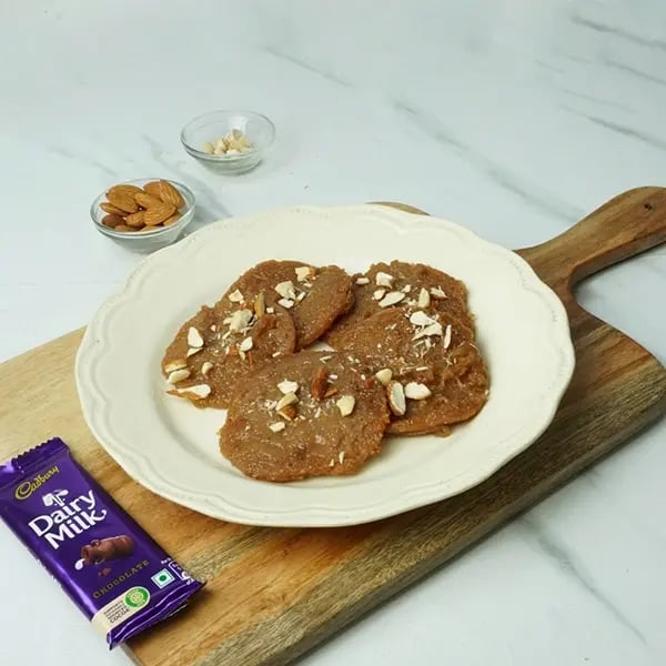 Dairy Milk Malpua with Cashew and Almonds - Chopped cashews and almonds
