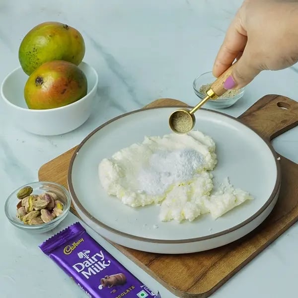 Dairy Milk Mango Sandesh Roll-In a plate knead fresh paneer