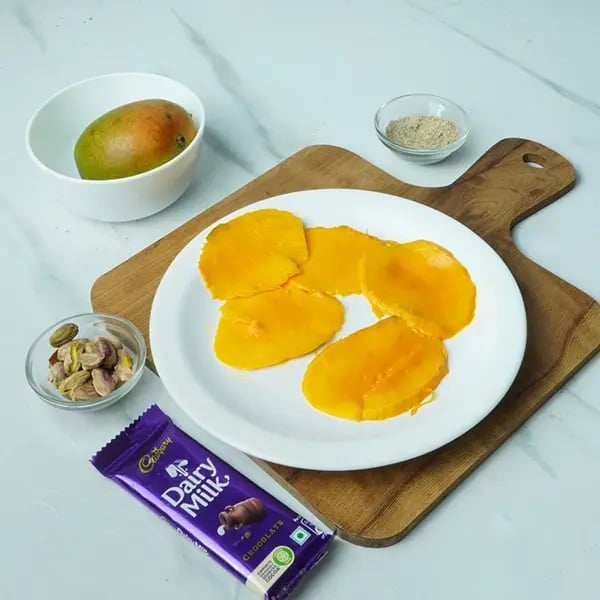 Dairy Milk Mango Sandesh Roll-Wash the mangoes