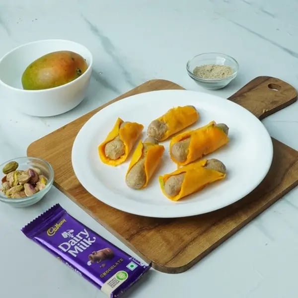 Dairy Milk Mango Sandesh Roll-Wrap the chenna