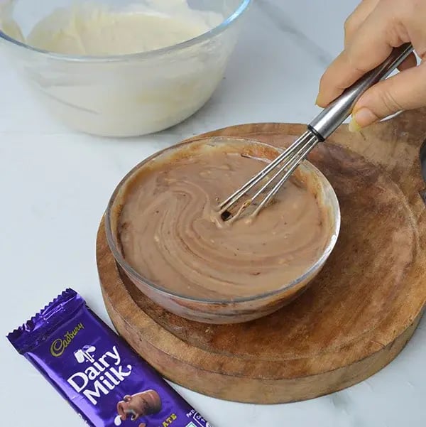 Dairy Milk Marble Coffee Cake - Mix the chocolate and coffee mixture with the batter