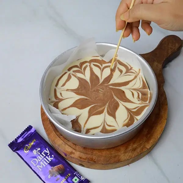 Dairy Milk Marble Coffee Cake - Swirl the chocolate batter