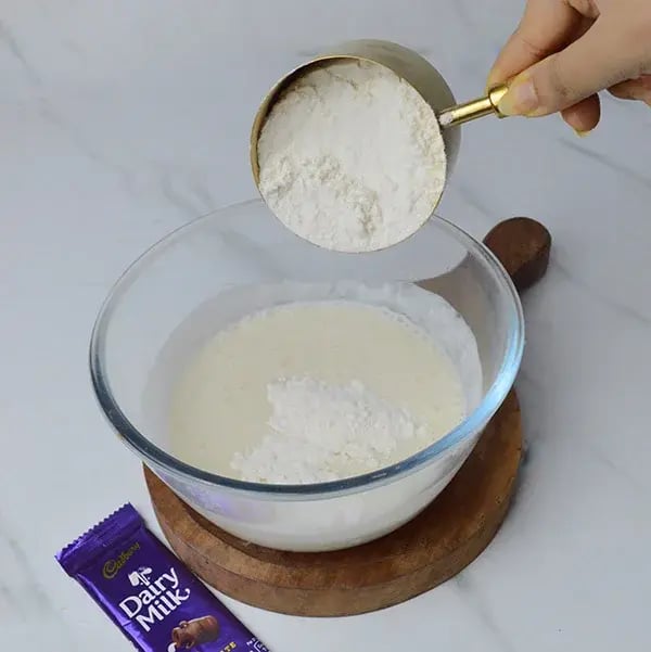 Dairy Milk Marble Coffee Cake - Maida and start mixing again