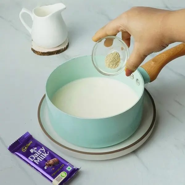 Dairy Milk Mishti Doi -Now add cardamom powder