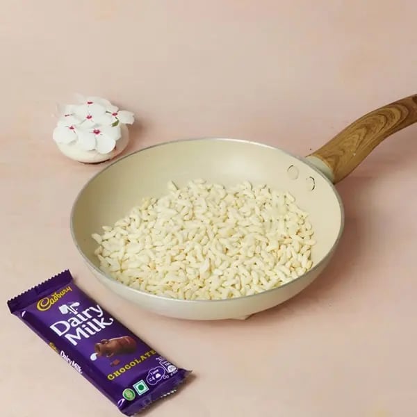 Dairy Milk Murmura Moa Laddu-Take a non-stick pan