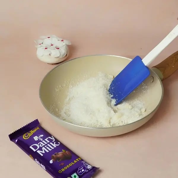 Dairy Milk Murmura Moa Laddu-On the same pan