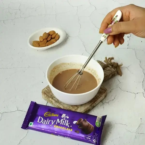 Dairy Milk Quick Fudge Nut Brownie - Stir the mixture well