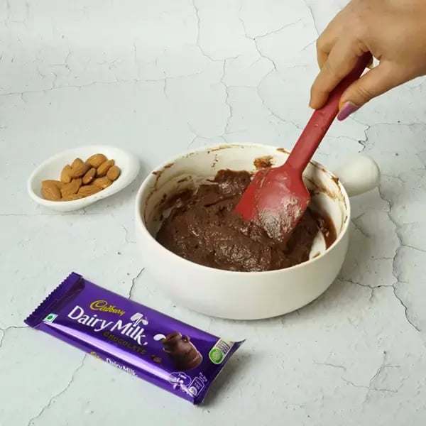 Dairy Milk Quick Fudge Nut Brownie - Mix everything together