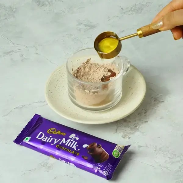 Dairy Milk Quick Mug Cake With Nuts - Pour in the oil