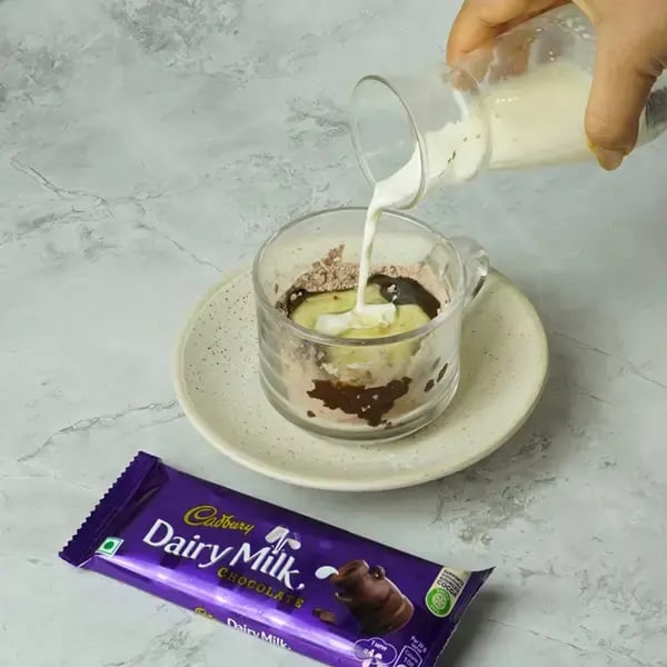 Dairy Milk Quick Mug Cake With Nuts - Add the milk