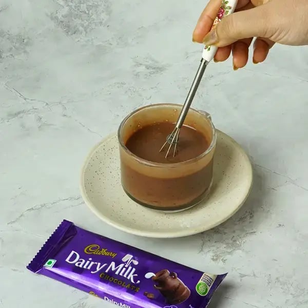Dairy Milk Quick Mug Cake With Nuts - Gently mix all the ingredients together