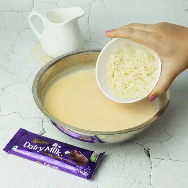 Dairy Milk Rice Kheer With Caramel Sauce - Add the soaked rice