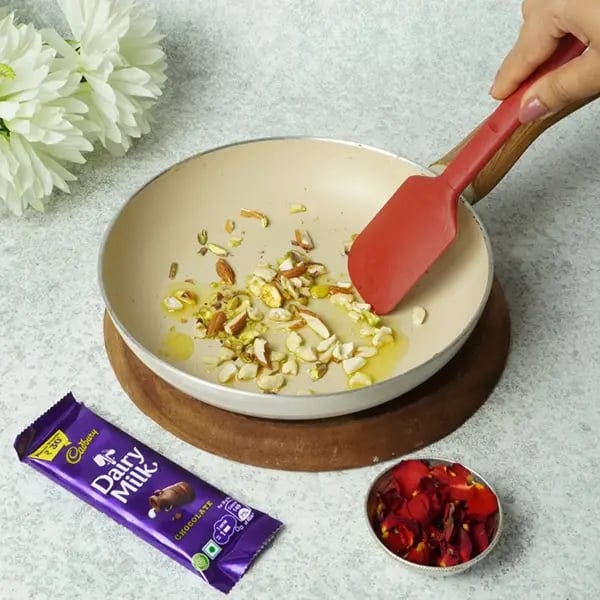 Dairy Milk Sabudana Pudding for Navratri - Add ghee to a pan
