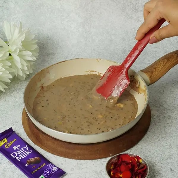 Dairy Milk Sabudana Pudding for Navratri - Continue stirring