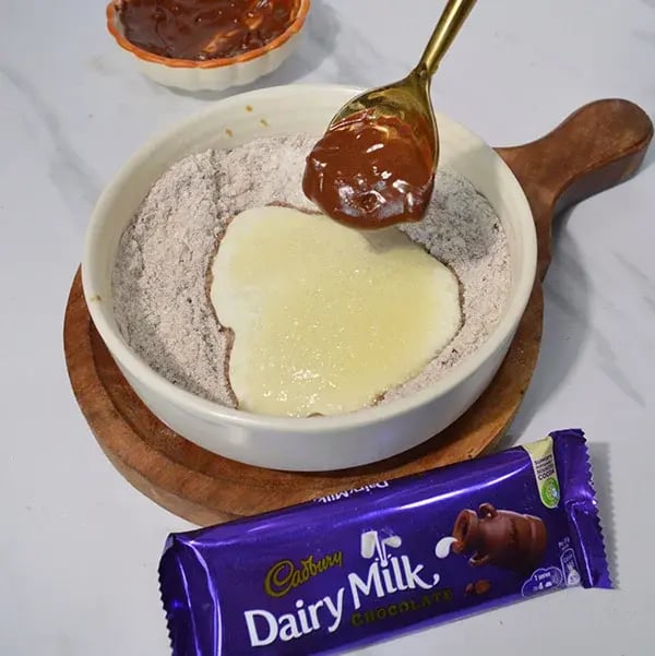 Dairy Milk Salted Caramel Cashew Brownie - Add the melted chocolate