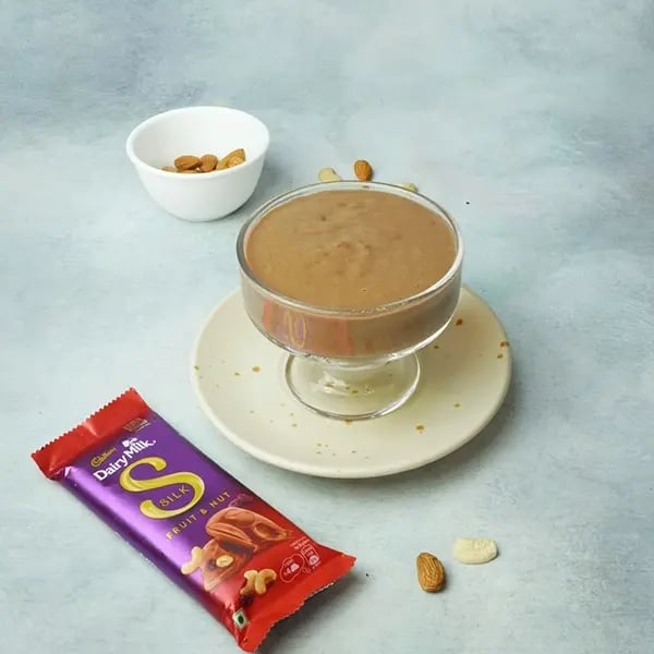 Dairy Milk Silk Chocolate Pudding with Cashew Almonds Garnish - Pour the mixture