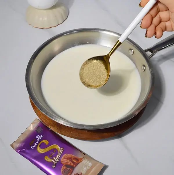 Dairy Milk Silk Chocolate Rasmalai Dessert - Add cardamom powder