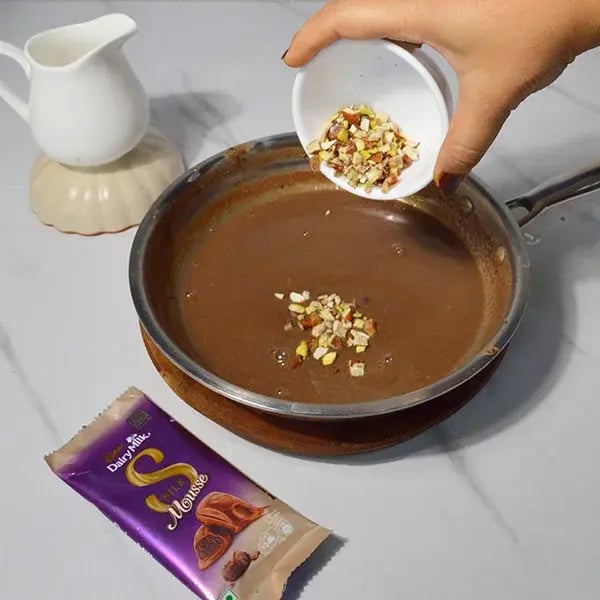 Dairy Milk Silk Chocolate Rasmalai Dessert - Stir in chopped dry fruits